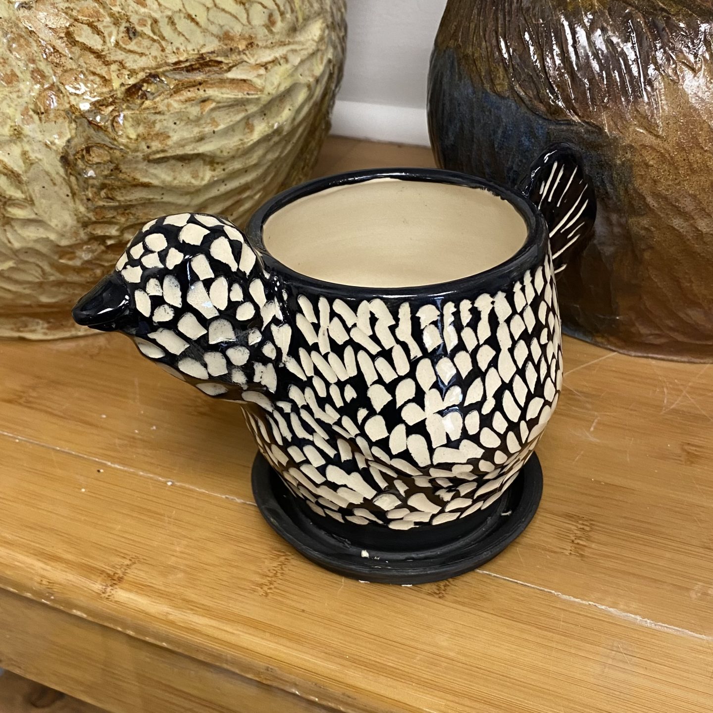 Black and white chicken planter